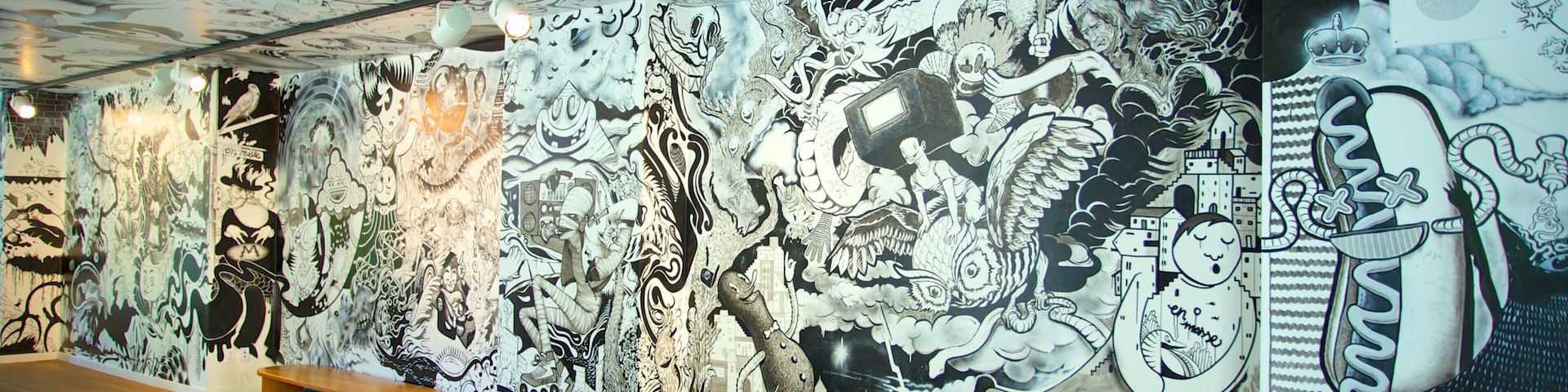 Downtown Montreal showing art, a city and interior views