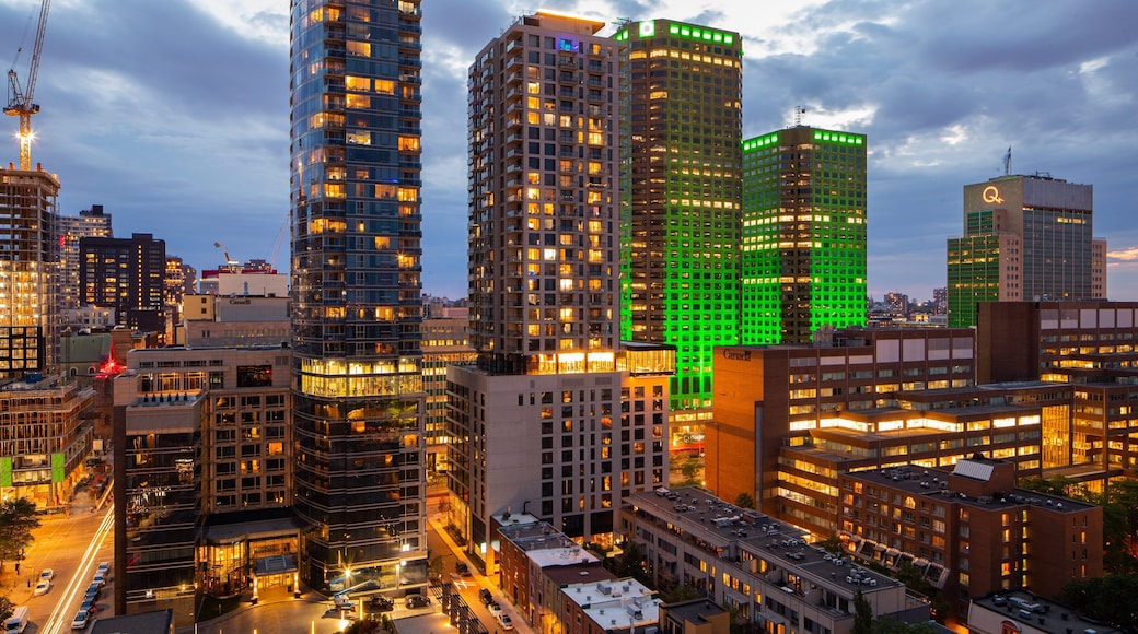 Downtown Montreal featuring a city, a high rise building and night scenes