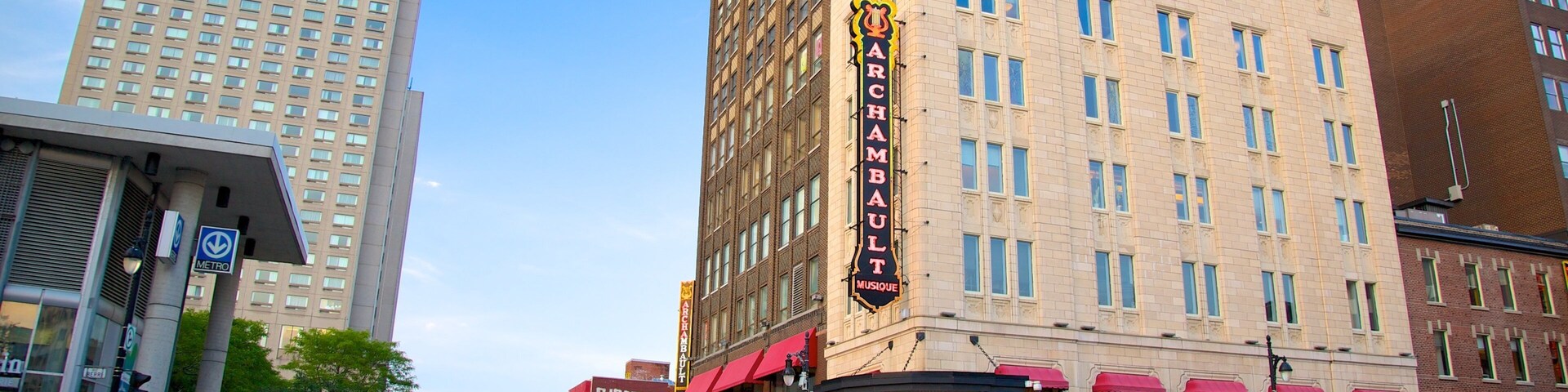 Latin Quarter showing a city, signage and street scenes