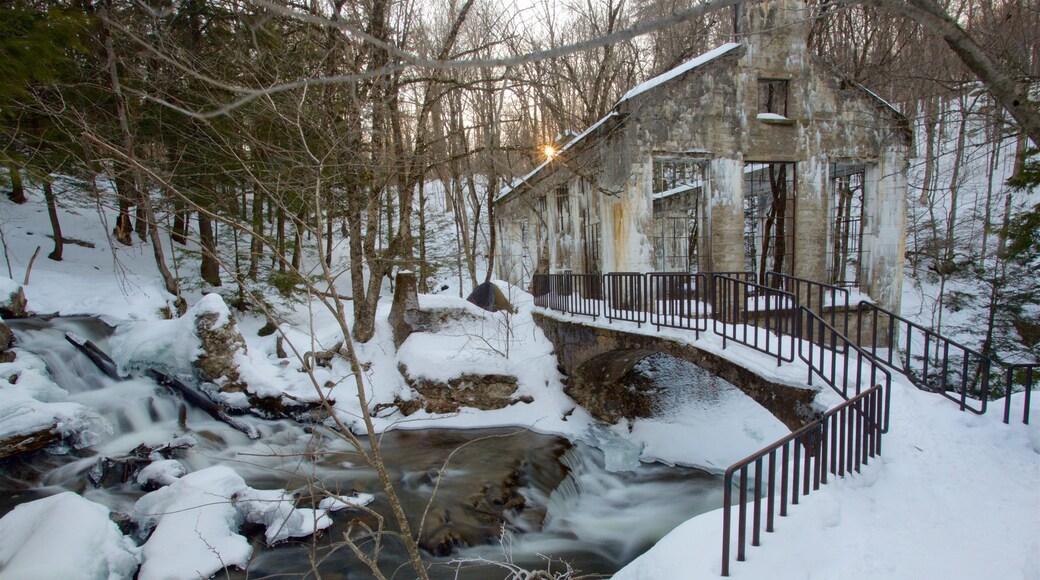 Outaouais featuring a bridge, a river or creek and snow