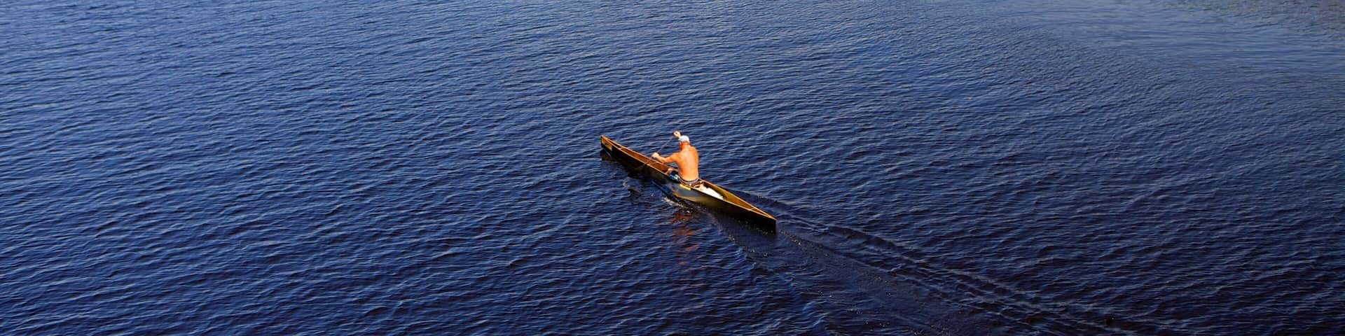 Bridgewater showing kayaking or canoeing and a lake or waterhole as well as an individual male