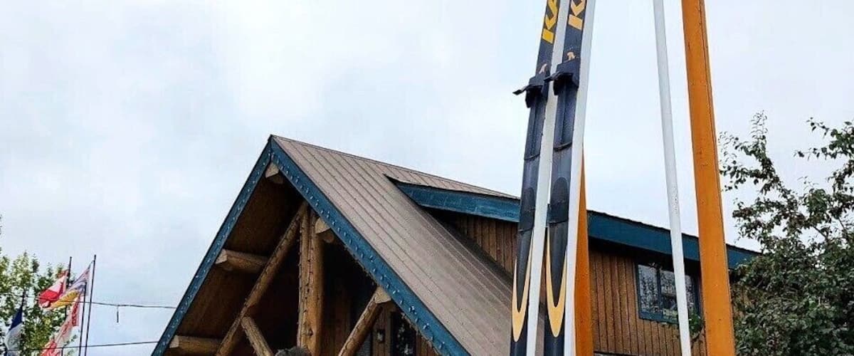 Giant skis at 100 Mile House, BC, a popular cross-country ski area. The skis height: 39 Feet (12 Metres) Poles height: 30 Feet (9 Metres) and Weight: 1,200 pounds. (September 2019)