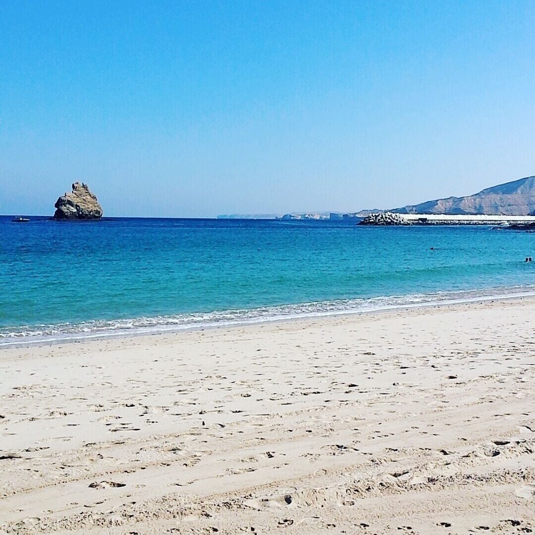This is just one of the many serene places in Muscat, Oman. Just off the Sultan Qaboos HQ enjoy clear waters with a view that is incredible.  Paradise on earth! #endlesssummer 
