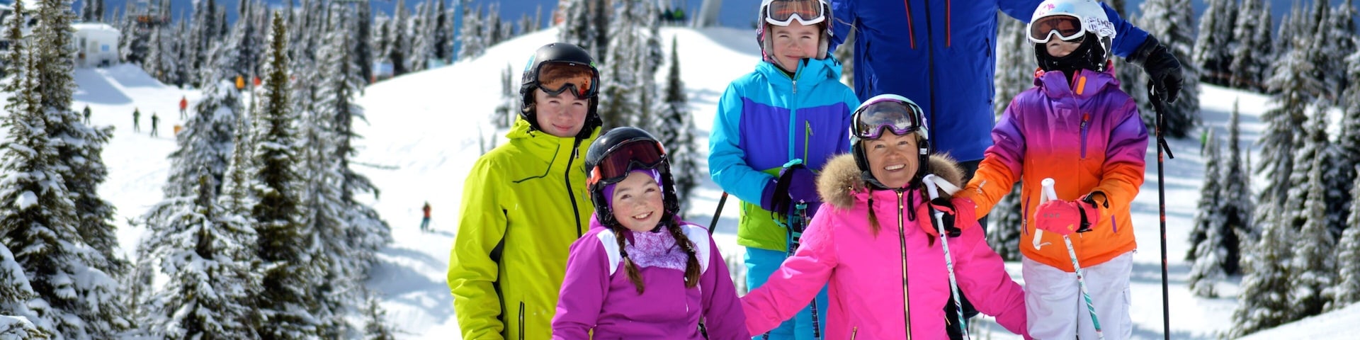 Big White Ski Resort featuring snow as well as a family