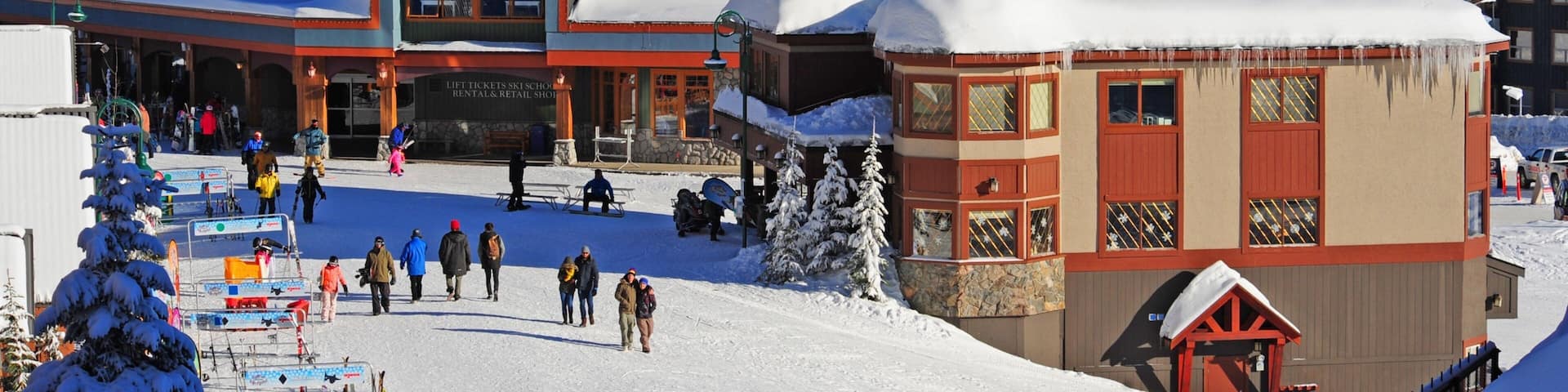 Big White Ski Resort showing snow as well as a small group of people