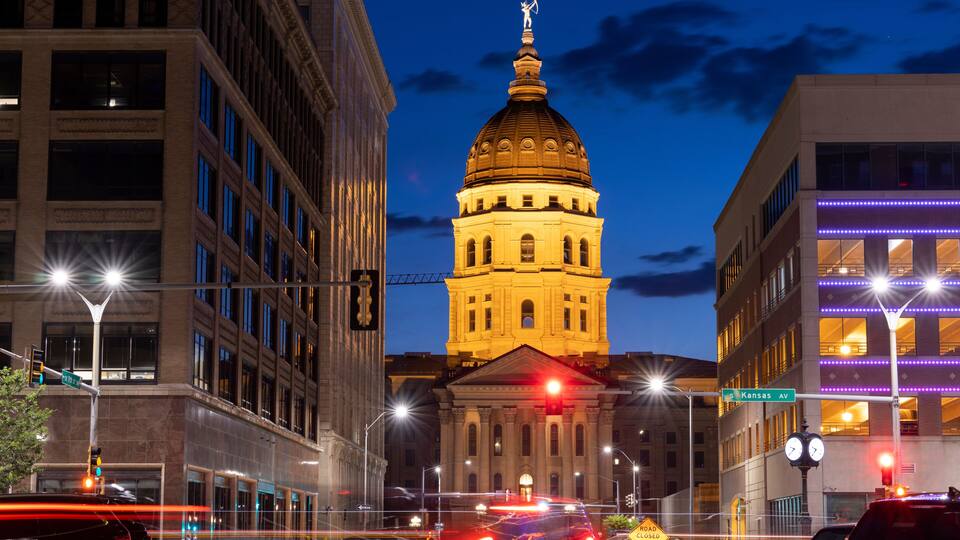 Twilight view of the historic state capitol building of downtown Topeka, Kansas, USA.