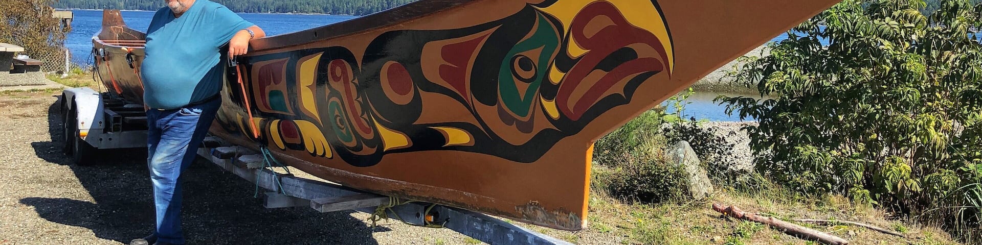 Bill Henderson was born 1950 into the Wei Wai Kum First Nation in Campbell River, BC. Since he was a child Bill watched his father create carvings and other art works. His masks, bowls, totem poles, paddles and other carvings are collected all over the world. Location: 2411 Spit Road. (September 2019)