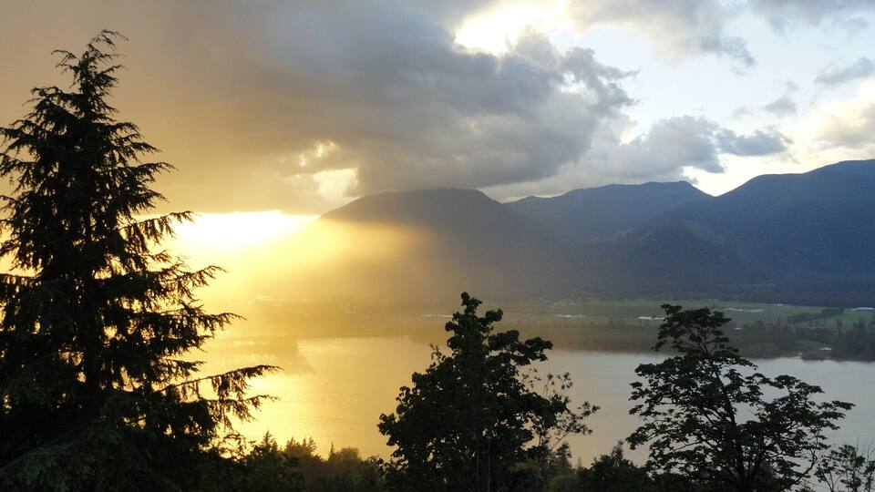 Sunset on Fraser Valley as a storm creeps up the valley