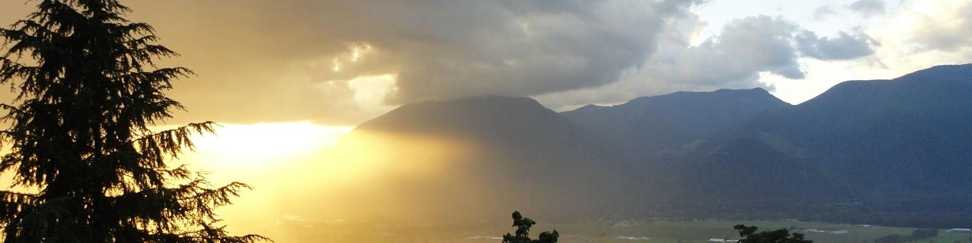 Sunset on Fraser Valley as a storm creeps up the valley