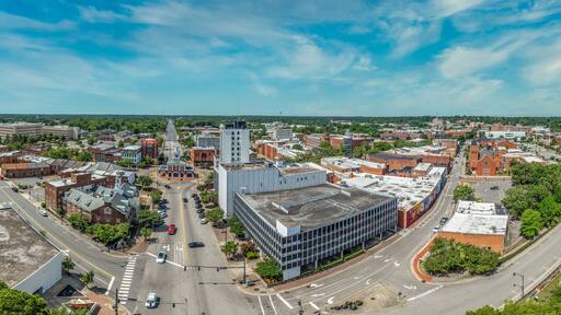 Aerial view of Fayetteville North Carolina downtown business district, main street in Cumberland county First Baptist Church. government buildings