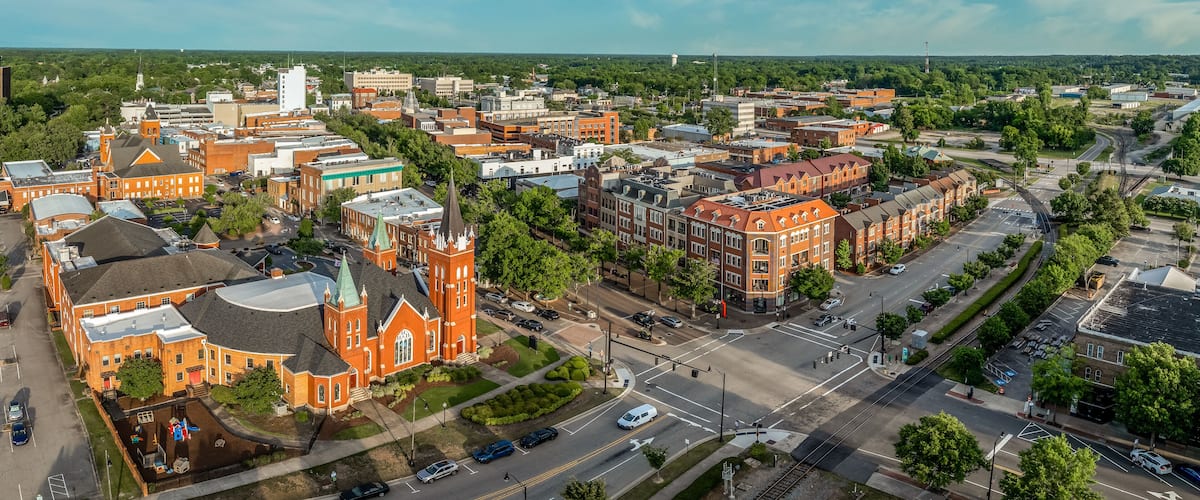 Aerial view of Fayetteville North Carolina downtown business district, main street in Cumberland county First Baptist Church. government buildings