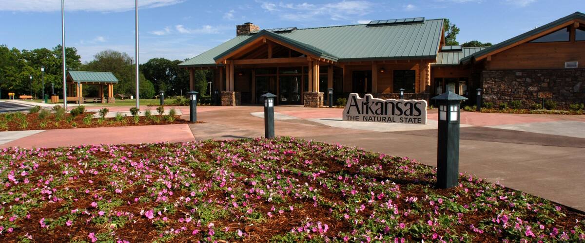 Fort Smith featuring wildflowers and signage
