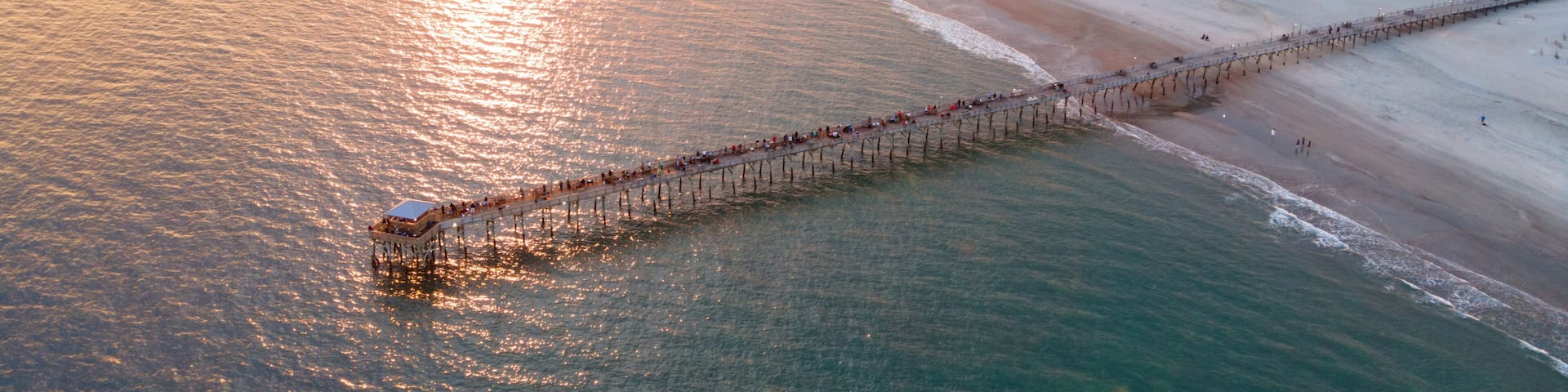 Drone View of Oceanana Pier in Atlantic Beach on the Crystal Coast of North Carolina at Sunset