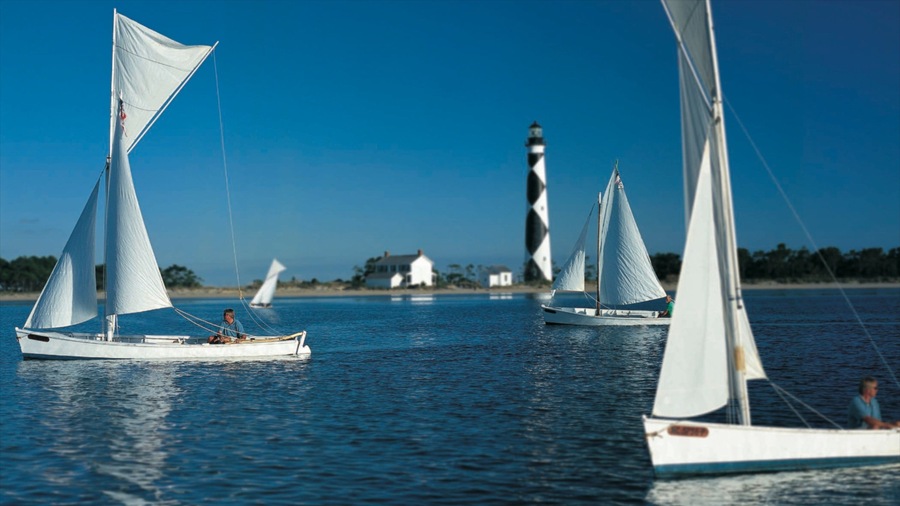 Morehead City which includes a lighthouse and sailing