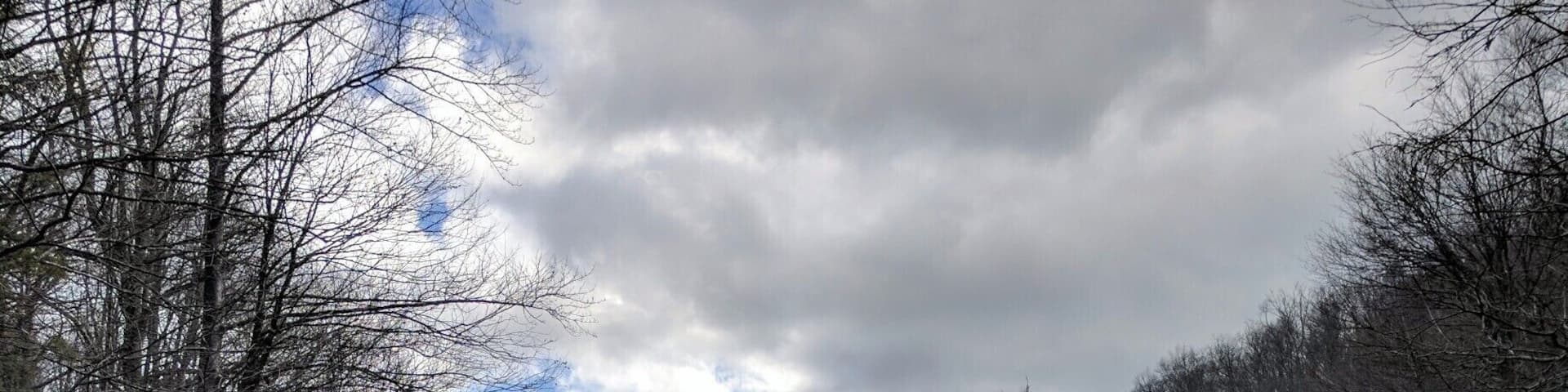 An off the path picture I took on a hike to the Hebron Rock Colony last February. A very serene setting, although there is a faint ominous feeling left by the darkened clouds. At App State we are surrounded by nature and this is one of my favorite photos that I've taken on a hike. Winter is still in effect as you can see from the barren trees and brown vegetation, but I remeber the day being warm as Spring would soon be on the way. This represents Appalachia for me because I can drive 15 minutes from my house and end up in a beautiful location such as this. #appalachianechoes