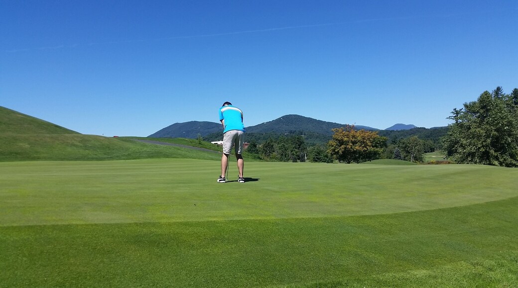 There's nothing like golfing on top of a mountain! What a beautiful day for it too.