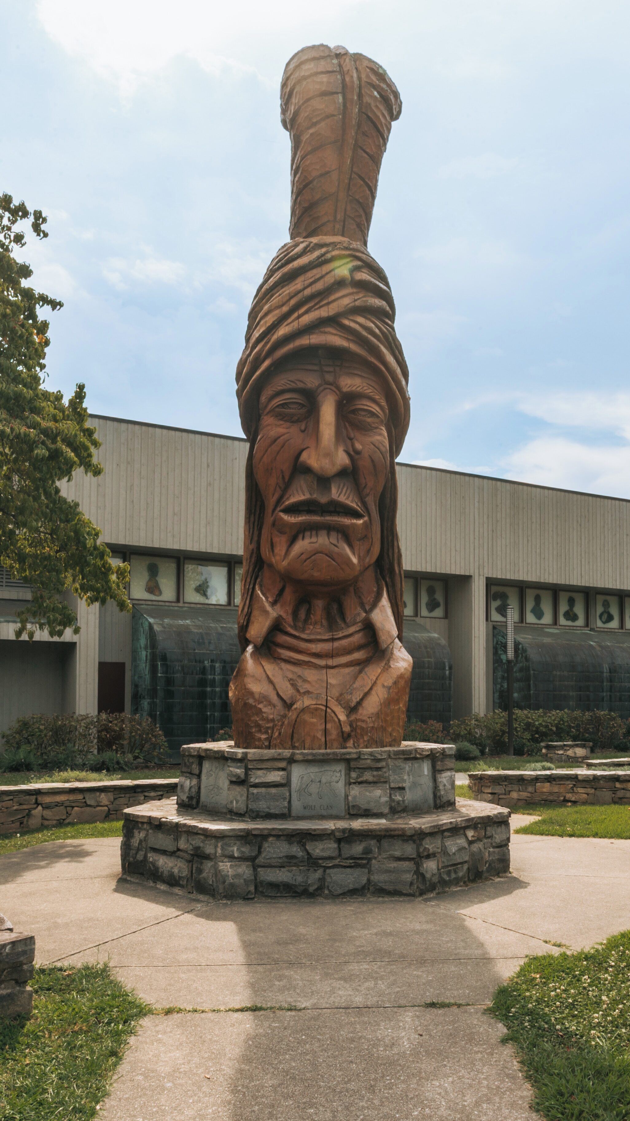 Cherokee culture exhibited at the Museum of the Cherokee Indian in North Carolina featuring a large wooden sculpture