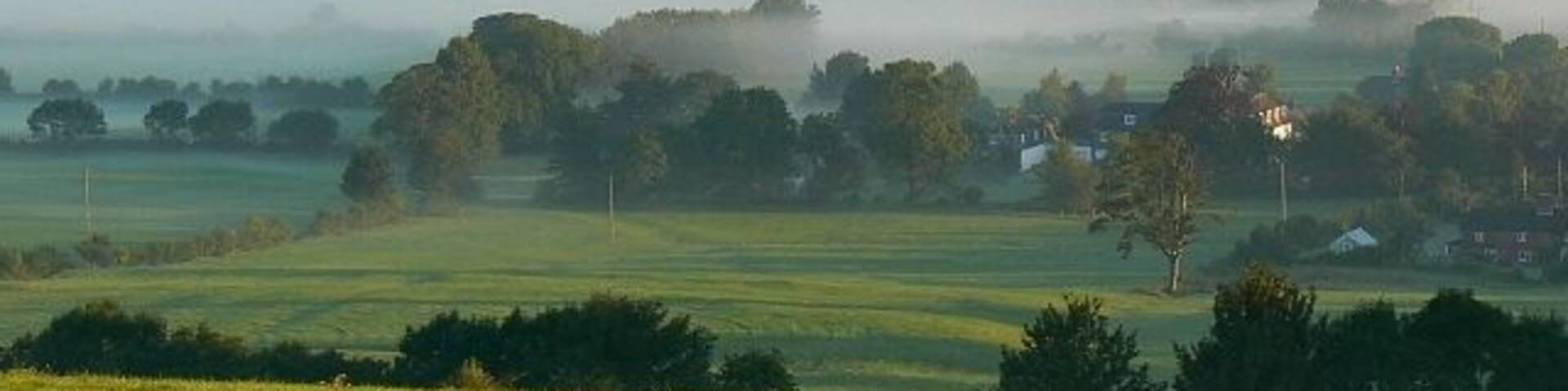 Elcombe, near Wroughton, Swindon Taken in the (for me) early morning from the hill leaving Wroughton to the south, a layer of mist virtually obscures the small village of Elcombe.