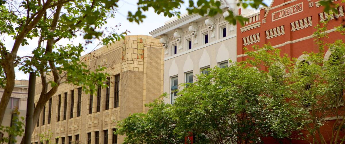 A historic building with ornate architectural details and a red brick facade.