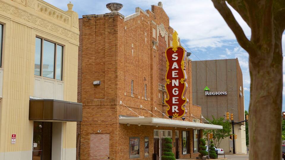 A theater with a marquee reading "SAENGER" and a billboard for "REGIONS" in the background.