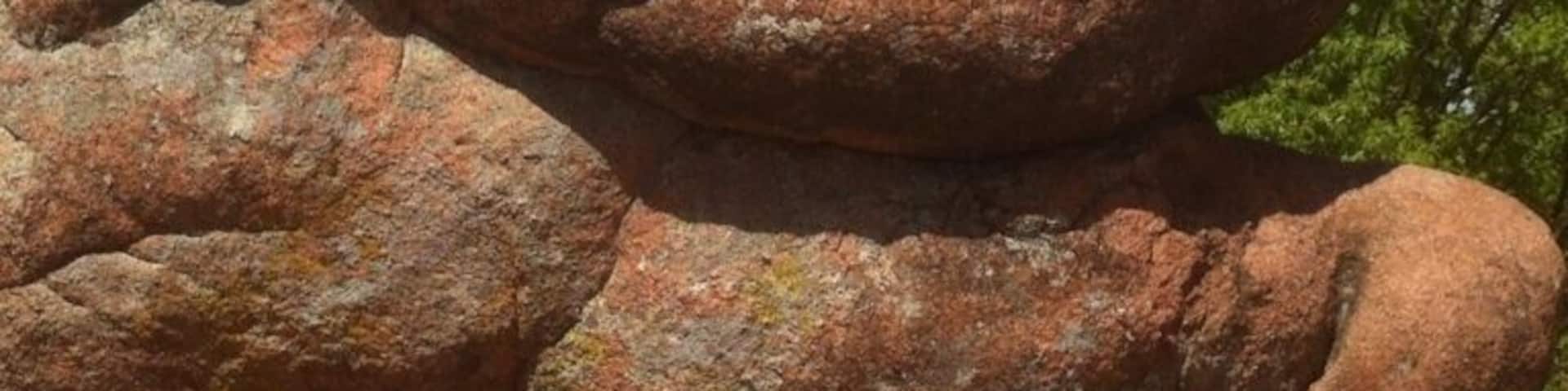 A huge granite boulder located in Elephant Rocks State Park