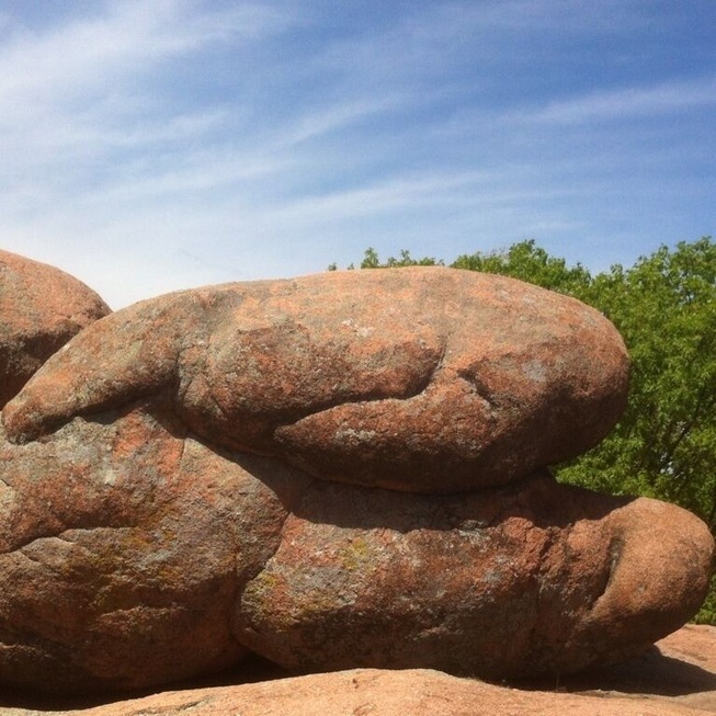 A huge granite boulder located in Elephant Rocks State Park