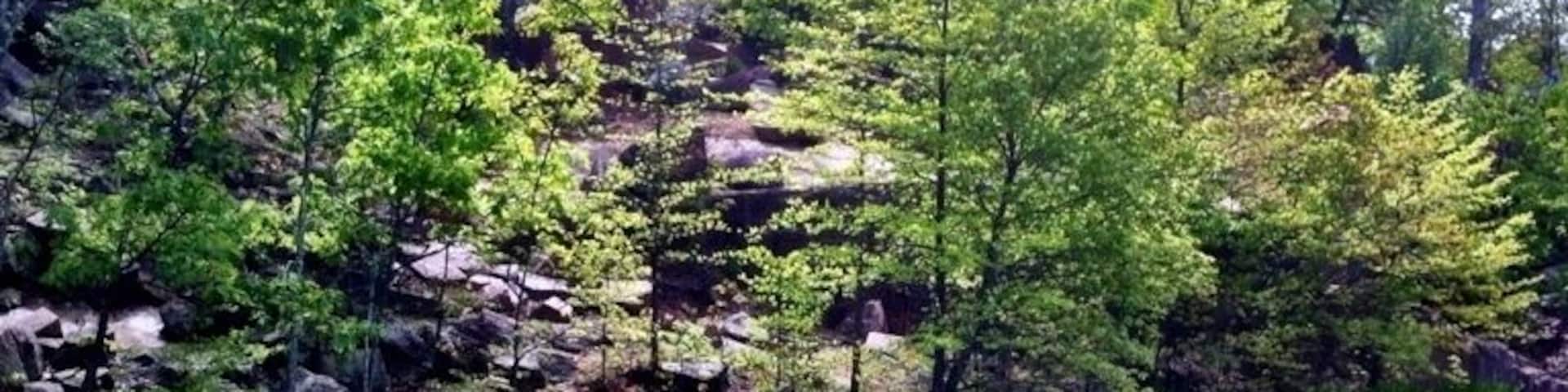 An old granite quarry that has filled with water. An beautiful spring hike around the lake got me this picture