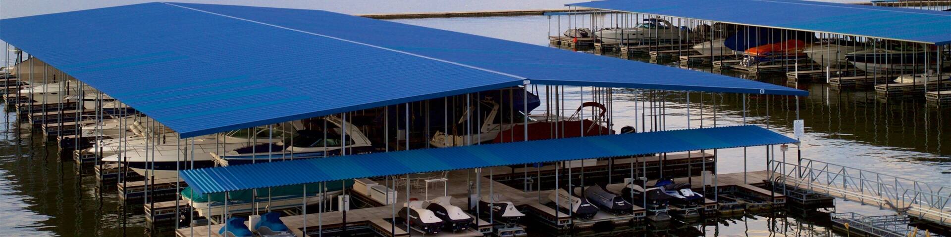 Osage Beach which includes a lake or waterhole and a bay or harbor