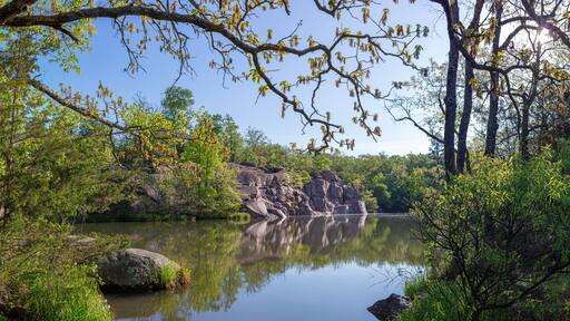 Scenic landscape of a flooded old quarry site at Elephant Rocks State Park in Belleview, MO