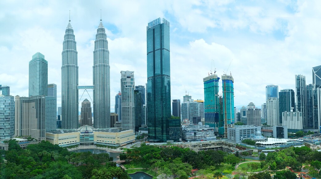 City skyline view of Kuala lumpur with iconic Twin towers and commercial buildings, Malaysia
