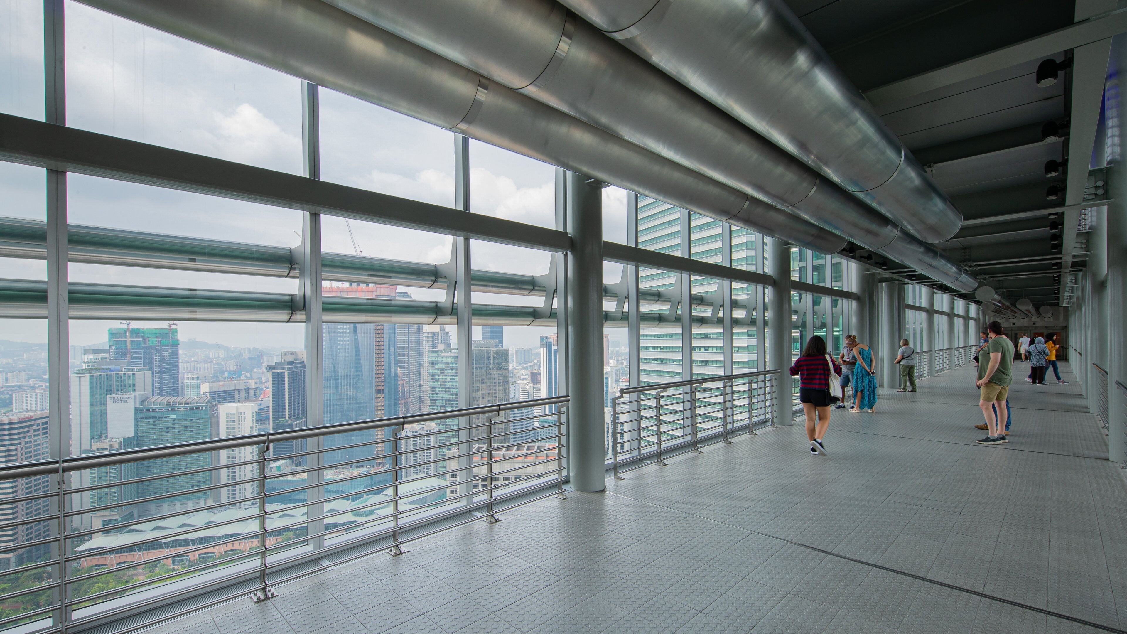 Petronas Twin Towers which includes a city, views and interior views