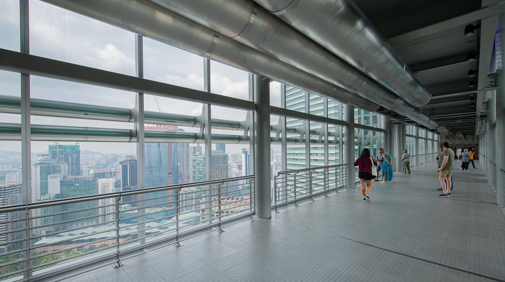Petronas Twin Towers which includes a city, views and interior views
