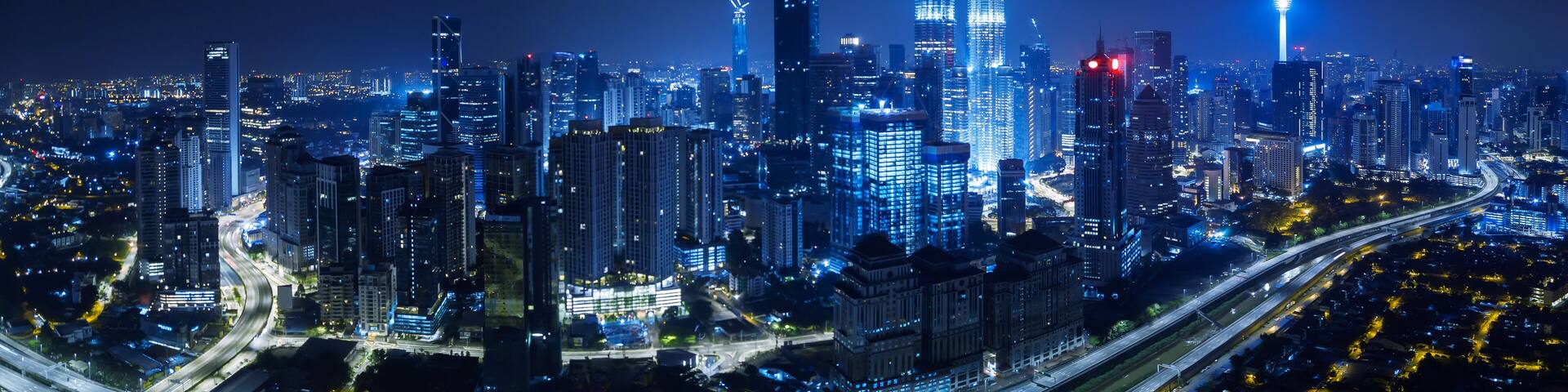 Panorama aerial view in the middle of Kuala Lumpur cityscape skyline .Night scene .