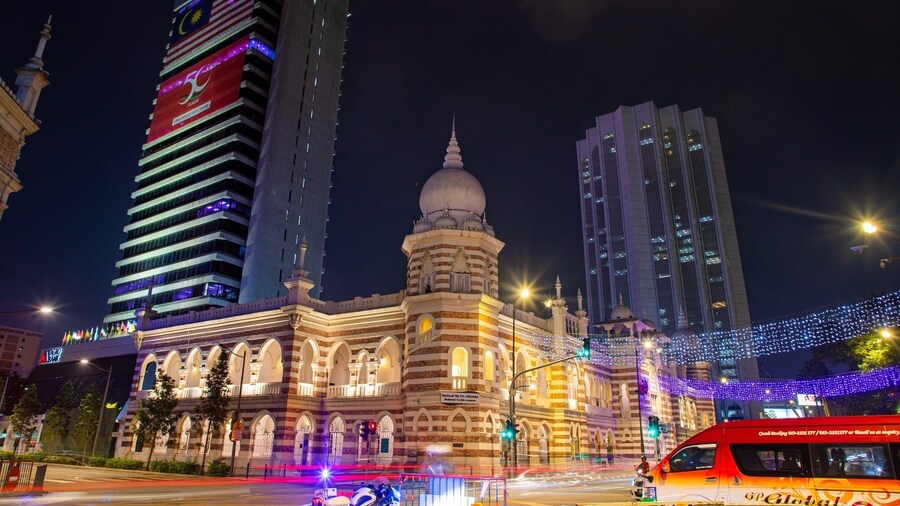 Merdeka Square featuring night scenes, a city and heritage architecture