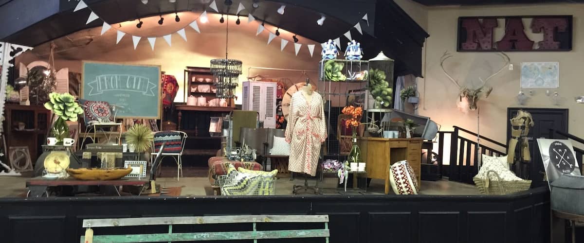 This very stage at the historic Nat ballroom is where numerous jazz wailers, big bands, and early Rock 'n' roll legends performed along Route 66. Little Richard was arrested here for taking his shirt off on stage in the '50s. Today the Nat is filled with antiques.