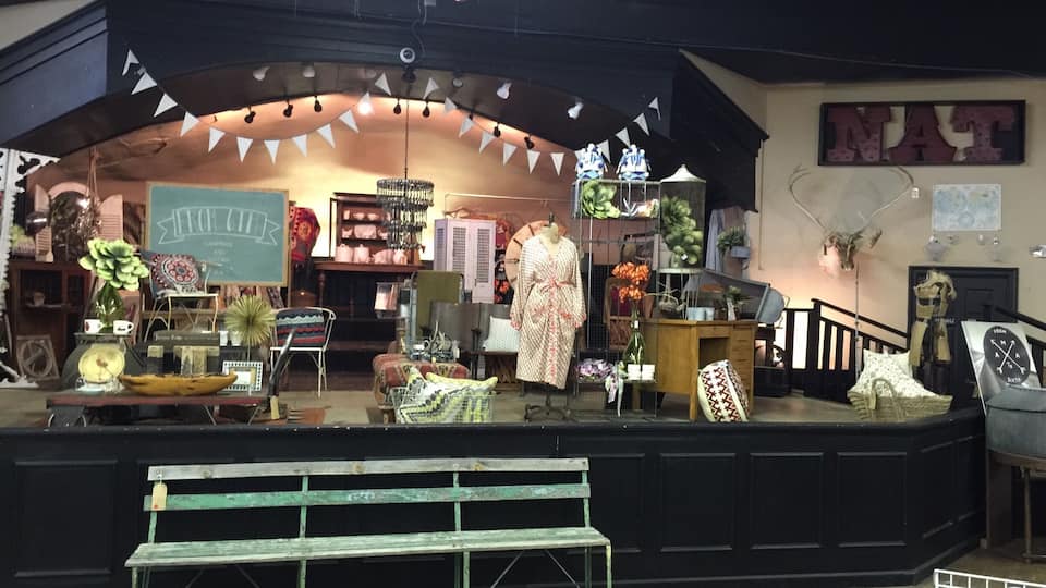 This very stage at the historic Nat ballroom is where numerous jazz wailers, big bands, and early Rock 'n' roll legends performed along Route 66. Little Richard was arrested here for taking his shirt off on stage in the '50s. Today the Nat is filled with antiques.