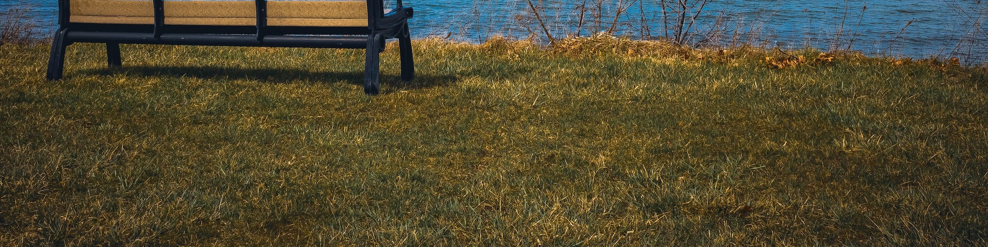 An empty bench overlooking Lake Erie in Geneva-On-The-Lake, Ohio