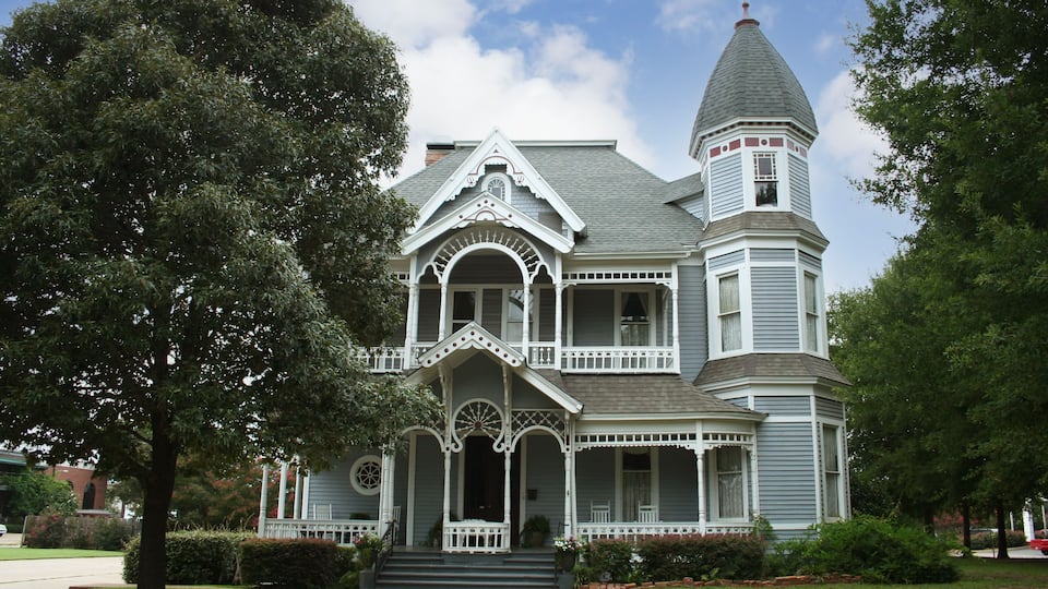 Victorian House WIth Trees and Blue Sky Nacogdoches Texas