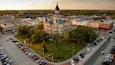 Denton which includes an administrative building, a sunset and heritage architecture