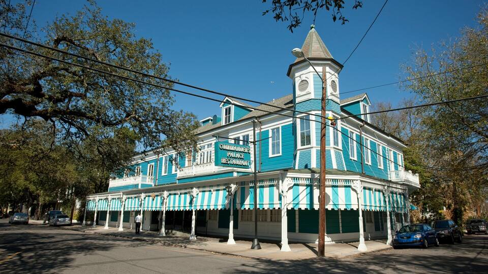 A historic building with a sign reading "Commander’s Palace Restaurant."