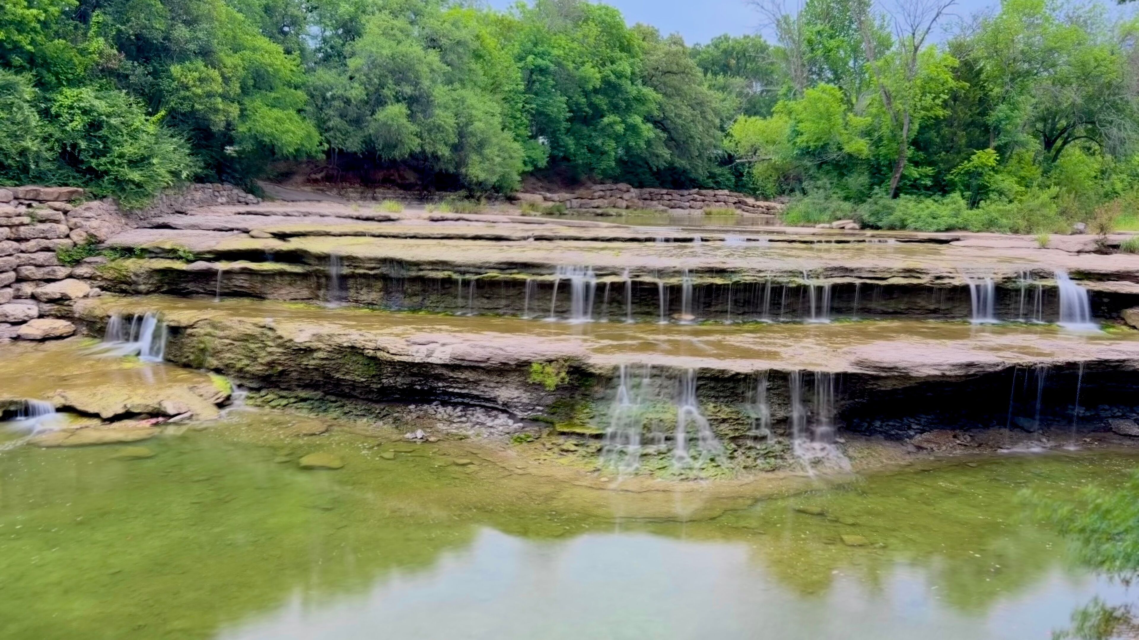 Airfield Falls Trailhead and Conservation Park where you'll find Tarrant County's largest natural waterfall.