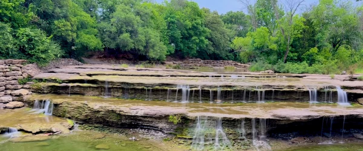 Airfield Falls Trailhead and Conservation Park where you'll find Tarrant County's largest natural waterfall.