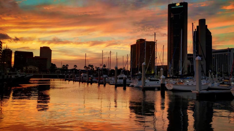 Tonight Rebecca and I are driving from Houston to the Rio Grande Valley to scout locations for a TV commercial we are shooting later this month. When we hit Corpus Christi we decided to grab a quick bite by the bay. Just as we sat down at our table at this floating "tavern" the sky went completely Technicolor. All the camera gear was packed in the car, so I snagged this pic with the iPhone 6s. Not a bad little cam in a pinch. #MagicHour #CityScapes #Bestof5