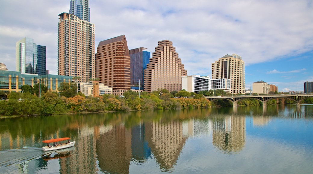 Hill Country featuring a river or creek, a city and boating