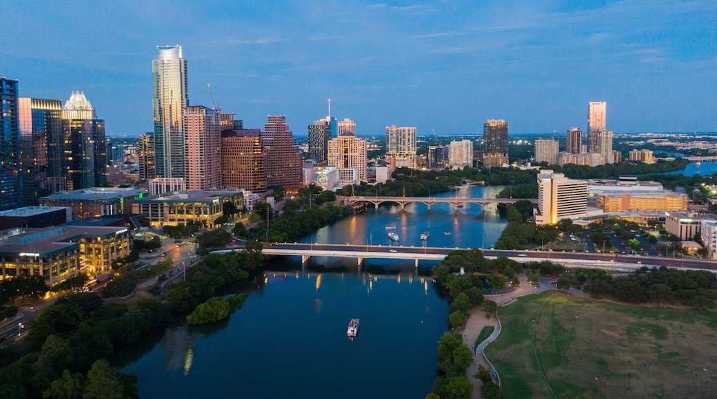 Downtown Austin showing night scenes, landscape views and a city