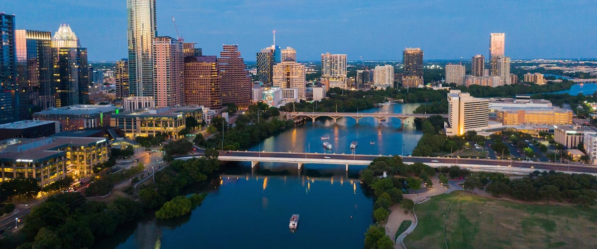 Downtown Austin showing night scenes, landscape views and a city