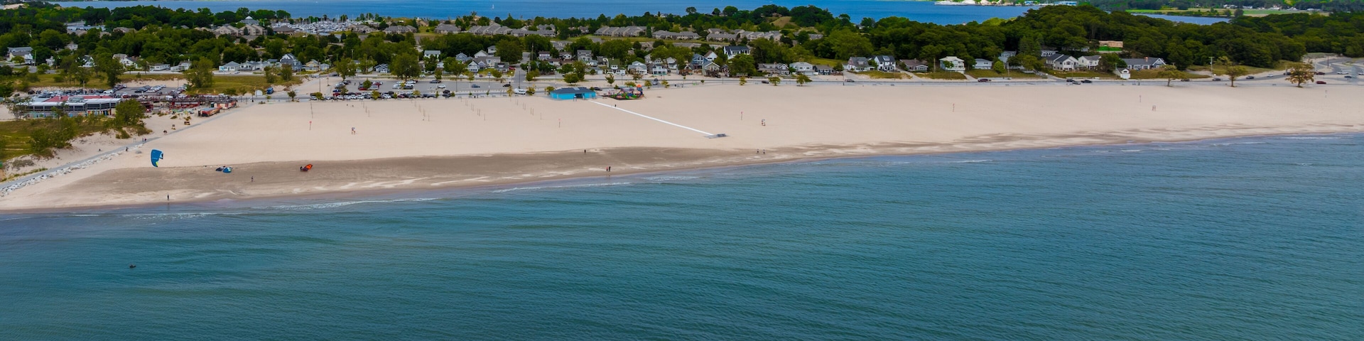 Aerial Drone View of Muskegon and Norton Shores Michigan Over Lake Michigan Coastline 2025