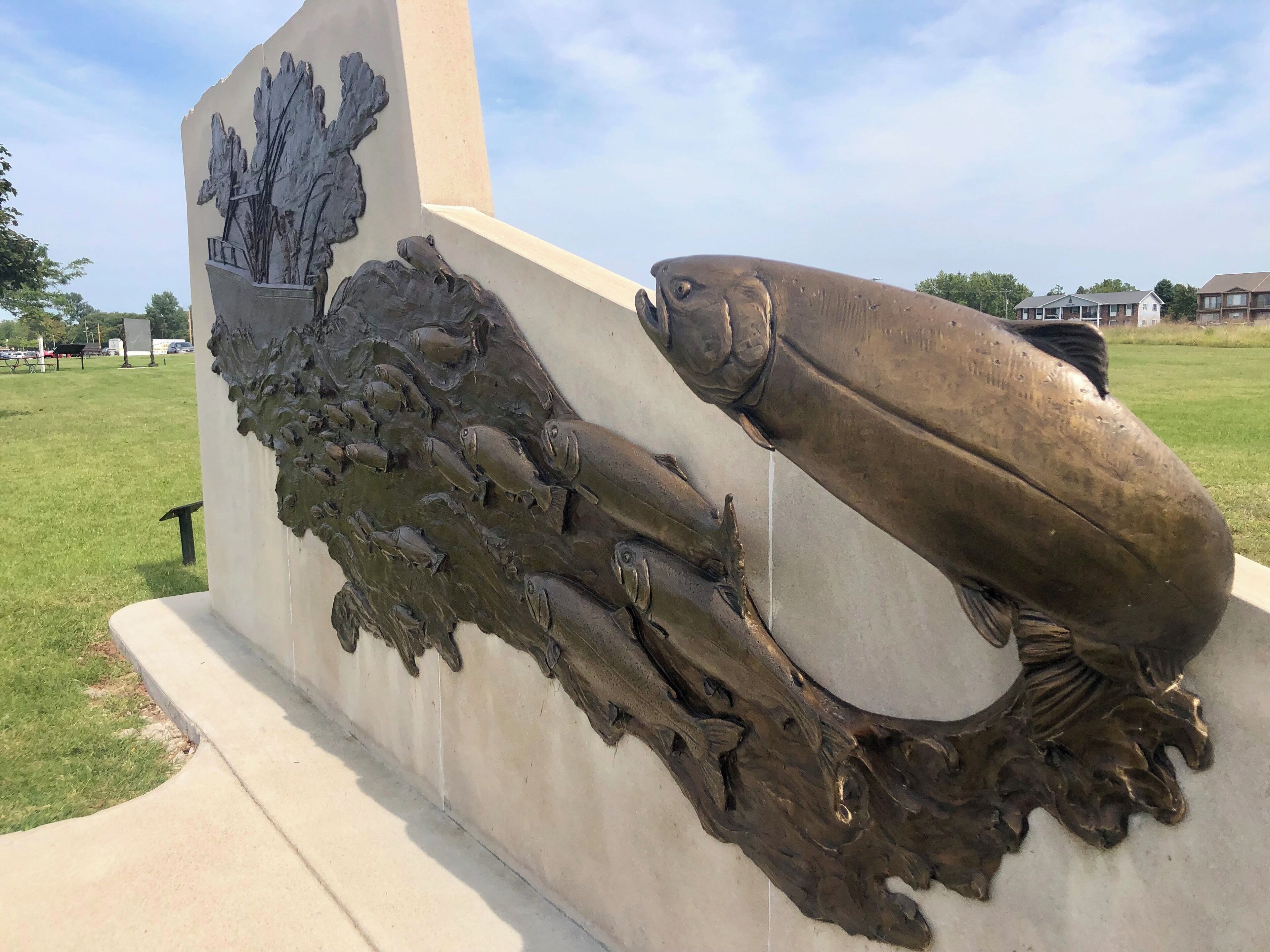 Sculpture recognizing the introduction of non-native Coho and Chinook Salmon into Lake Michigan’s tributaries in 1964 and 1966. Both fish thrived and increased the sport fishing industry in the lake.