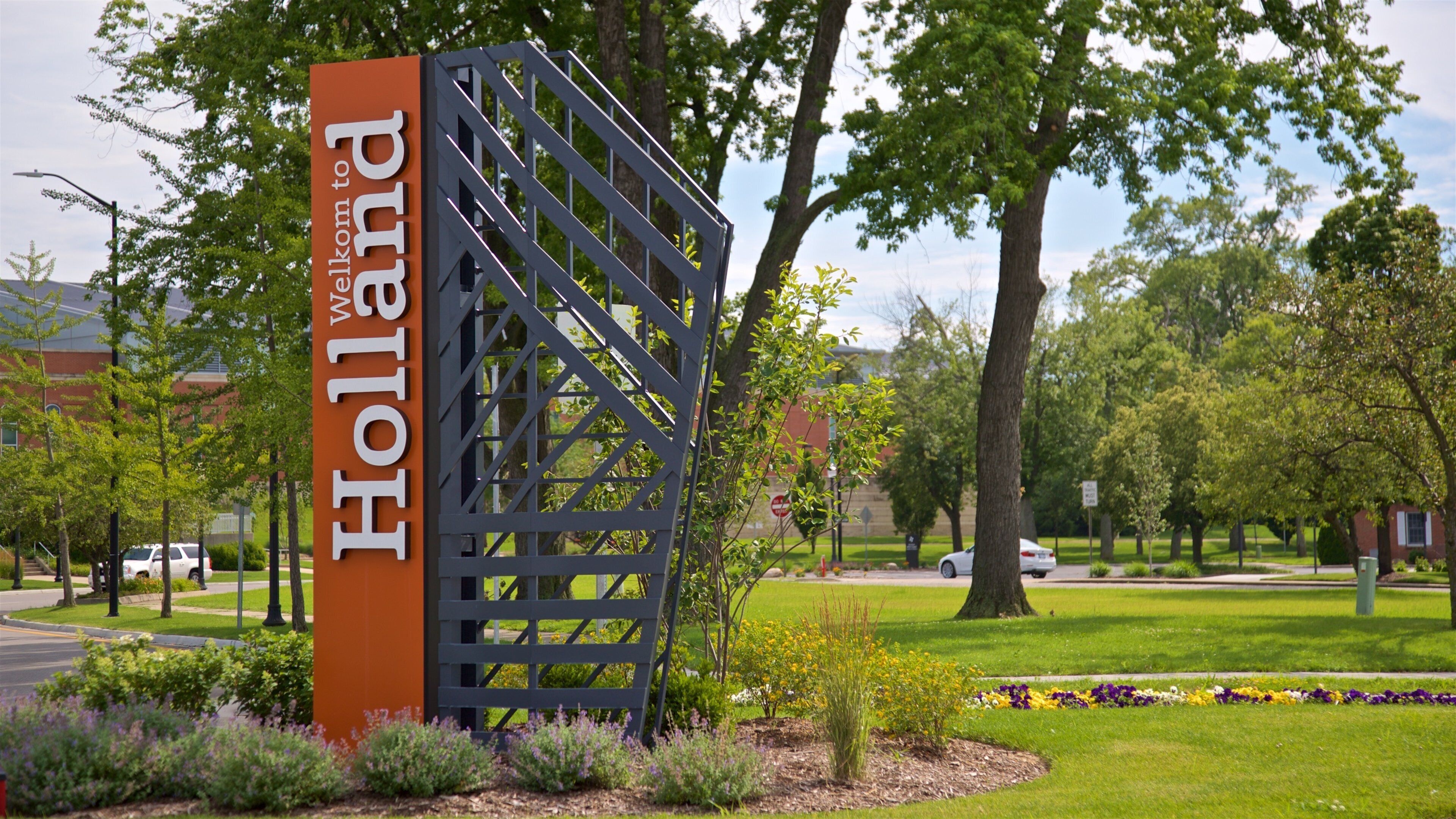 Holland featuring signage, a garden and wild flowers