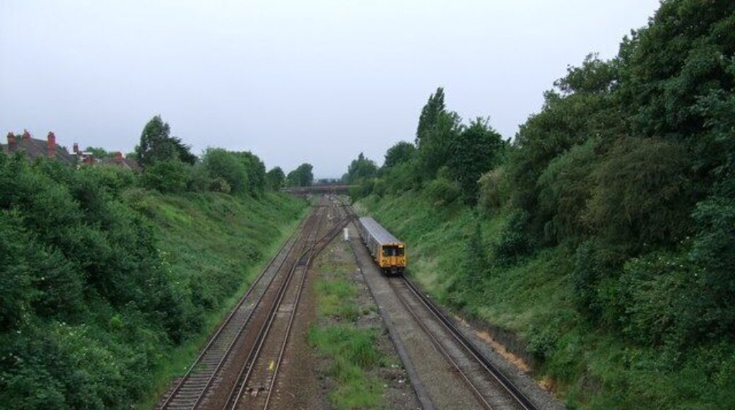 Hunts Cross, all change Merseyrail train approaching Hunts Cross station from Southport. The two lines on the left are from Liverpool Lime Street via the chord at Liverpool South Parkway (Allerton Junction) and continue (behind the photographer) to Manchester.